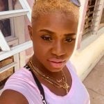 The woman who is accused of burning the mother and child with acid 