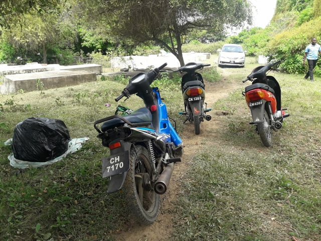 ‘Man’ runs from burial ground as motorcycles/ weed found