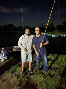 President Irfaan Ali is playing on the job